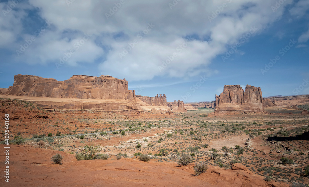 Dazzling Arches National Park in the summertime with sandstone formations on a partly cloudy day in Utah Dazzling Arches National Park in the summertime with sandstone formations on a partly cloudy day in Utah