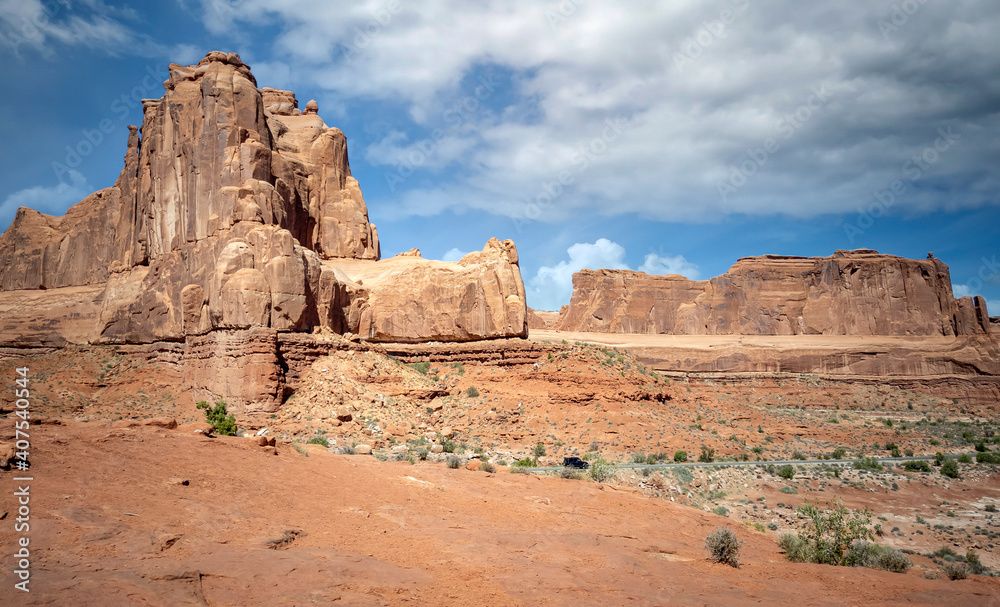 Dazzling Arches National Park in the summertime with sandstone formations on a partly cloudy day in Utah Dazzling Arches National Park in the summertime with sandstone formations on a partly cloudy day in Utah