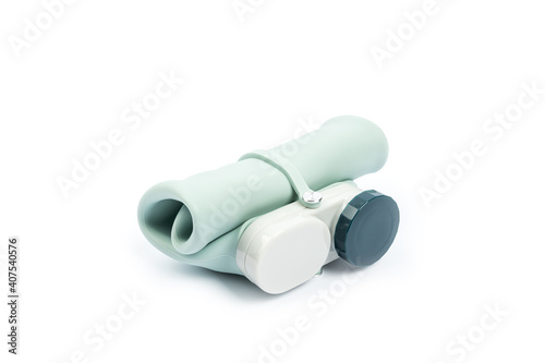 soft water bottle isolated white background. collapsible liquid container. travel equipment photo