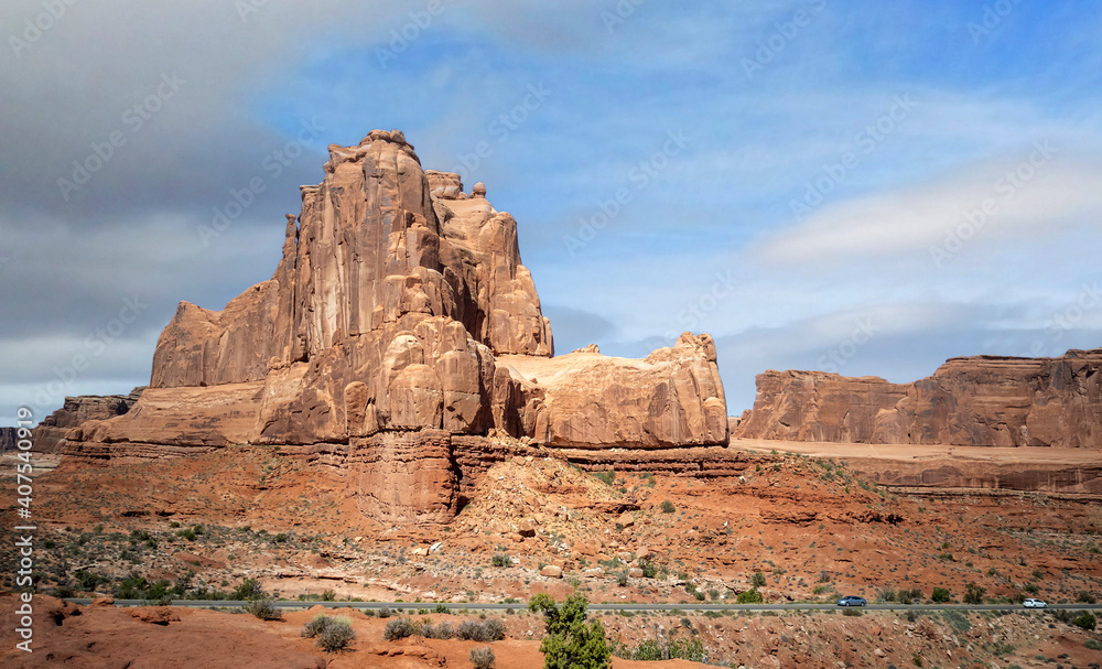 Dazzling Arches National Park in the summertime with sandstone formations on a partly cloudy day in Utah Dazzling Arches National Park in the summertime with sandstone formations on a partly cloudy day in Utah