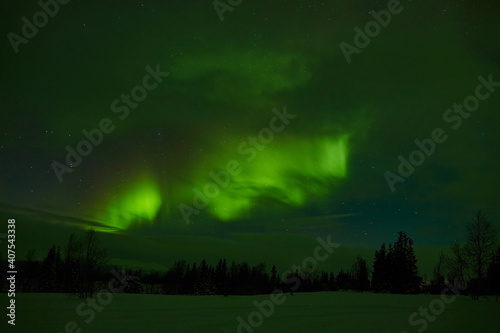 northern lights in the night sky © booleen
