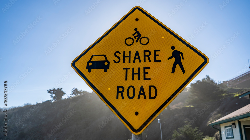 Share the road sign. walking, driving, cycling