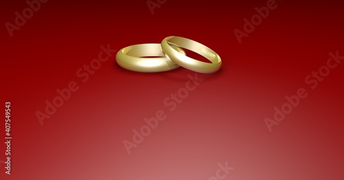 Isolated wedding rings, red surface