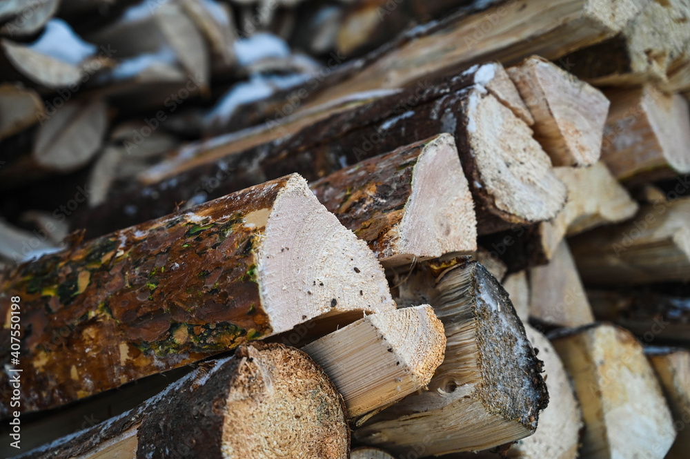 Close-up of firewood in wooden pile. Close-up of firewood in wooden pile.