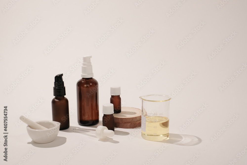skin care and cosmetic package. amber glass bottle for aromatherapy and natural product and essential oil for health on white background. skin care and cosmetic package. amber glass bottle for aromatherapy and natural product and essential oil for health on white background.