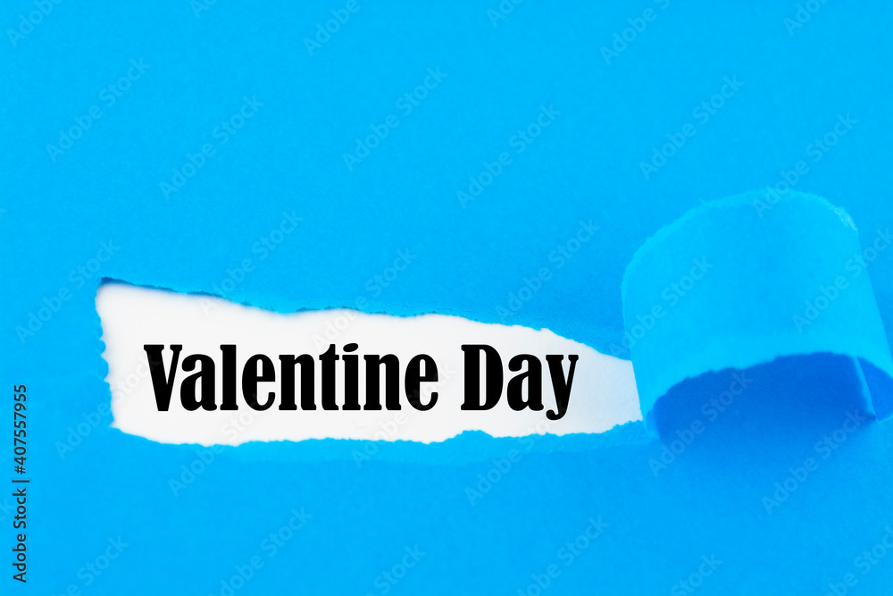 Valentine Day on torn paper background love and valentine concept Valentine Day on torn paper background love and valentine concept