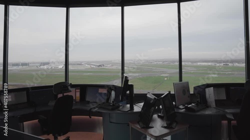 Abandoned airport traffic control tower against empty runways of Brussels Airport, Belgium