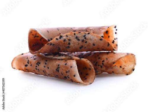 Square poppy seeds and sesame crackers isolated on white background. Dry cracker cookies isolated. Salty snacks isolated.