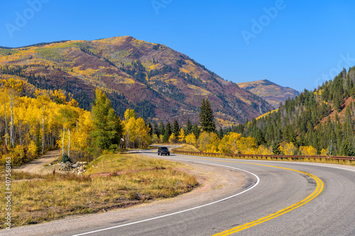 Autumn Mountain Road - A colorful Autumn view of a big and sharp switchback at north side of McClure Pass on State Highway 133, near Marble, Colorado, USA. photo
