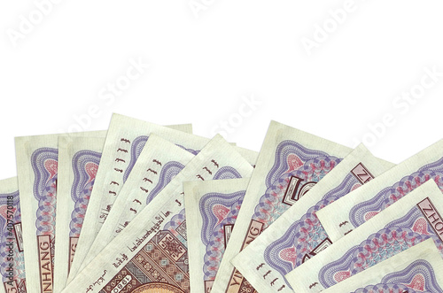 5 Chinese yuan bills lies on bottom side of screen isolated on white background with copy space. Background banner template photo