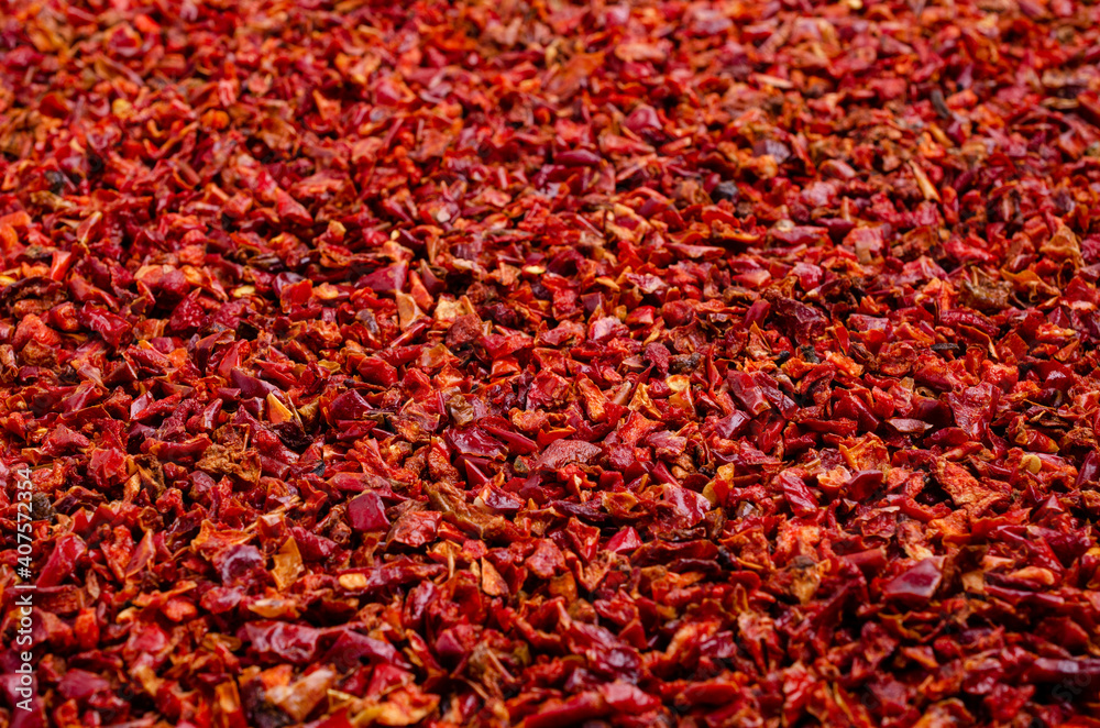 Fototapeta premium Slices of dry red pepper.