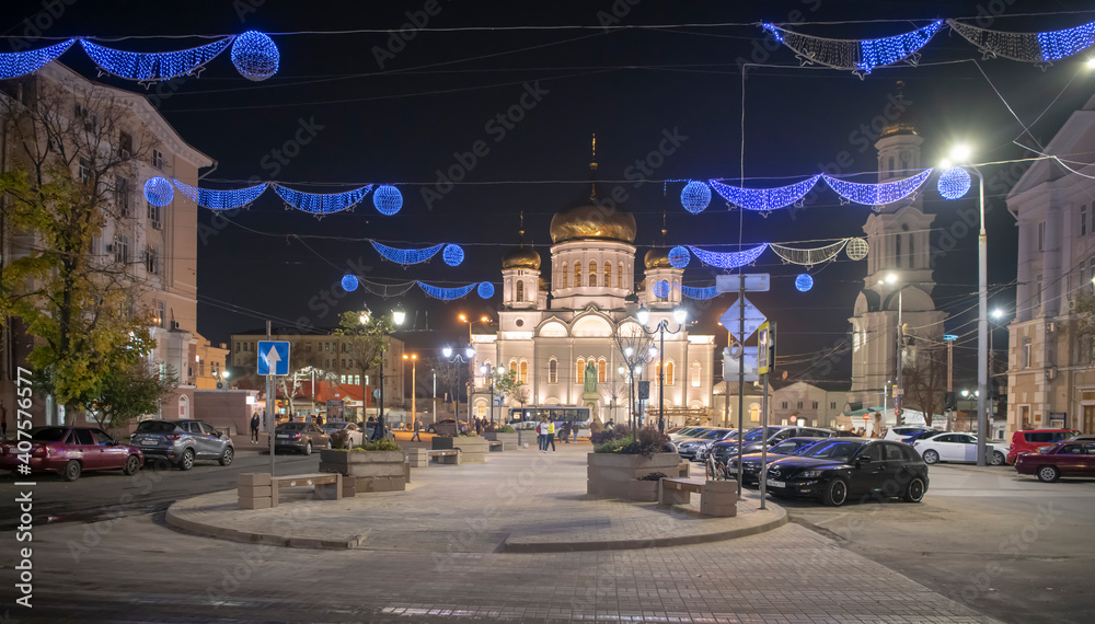 Fototapeta premium Citizens walk along Soborny lane