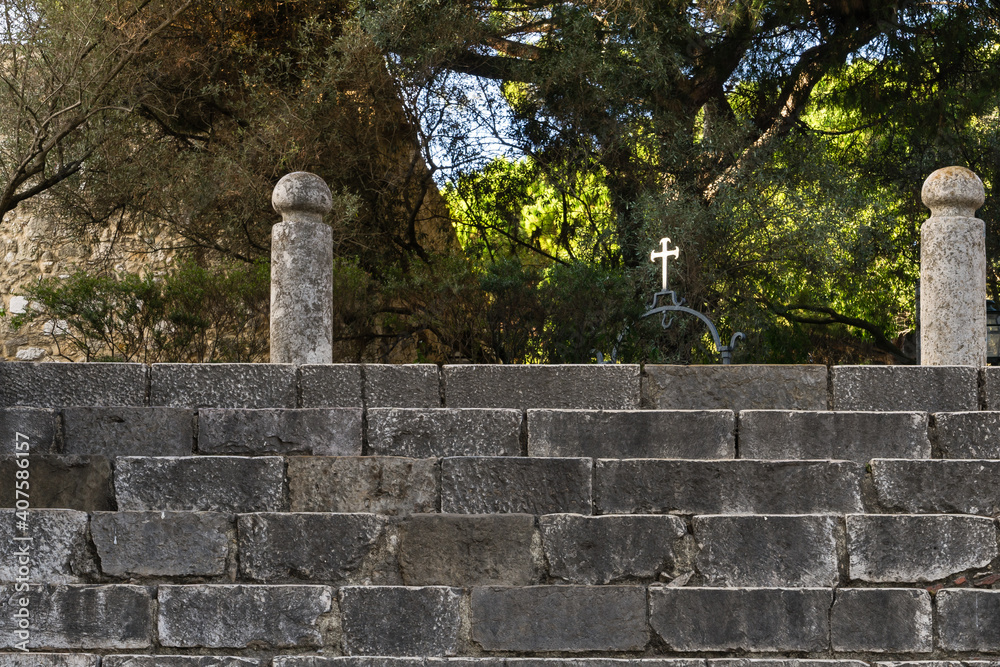 Metal cross element of the Castelo de S. Jorge yard Metal cross element of the Castelo de S. Jorge yard
