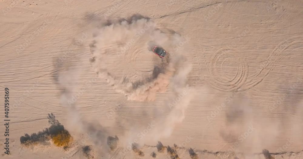 Off-road Vehicle doing donuts in the desert
