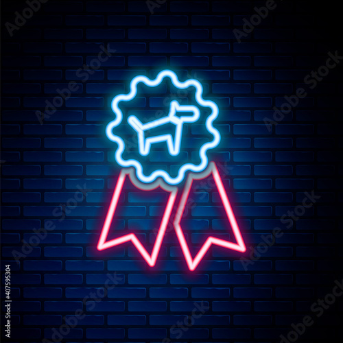 Glowing neon line Dog award symbol icon isolated on brick wall background. Medal with dog footprint as pets exhibition winner concept. Colorful outline concept. Vector.