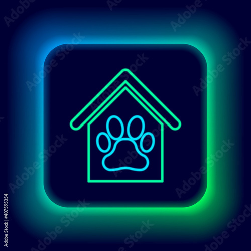 Glowing neon line Dog house and paw print pet icon isolated on black background. Dog kennel. Colorful outline concept. Vector.