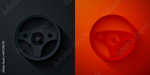 Paper cut Steering wheel icon isolated on black and red background. Car wheel icon. Paper art style. Vector.