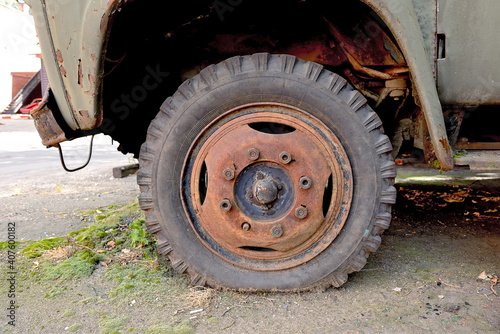 Old rusty wheel of a truck. Part of an old truck © FedotovAnatoly