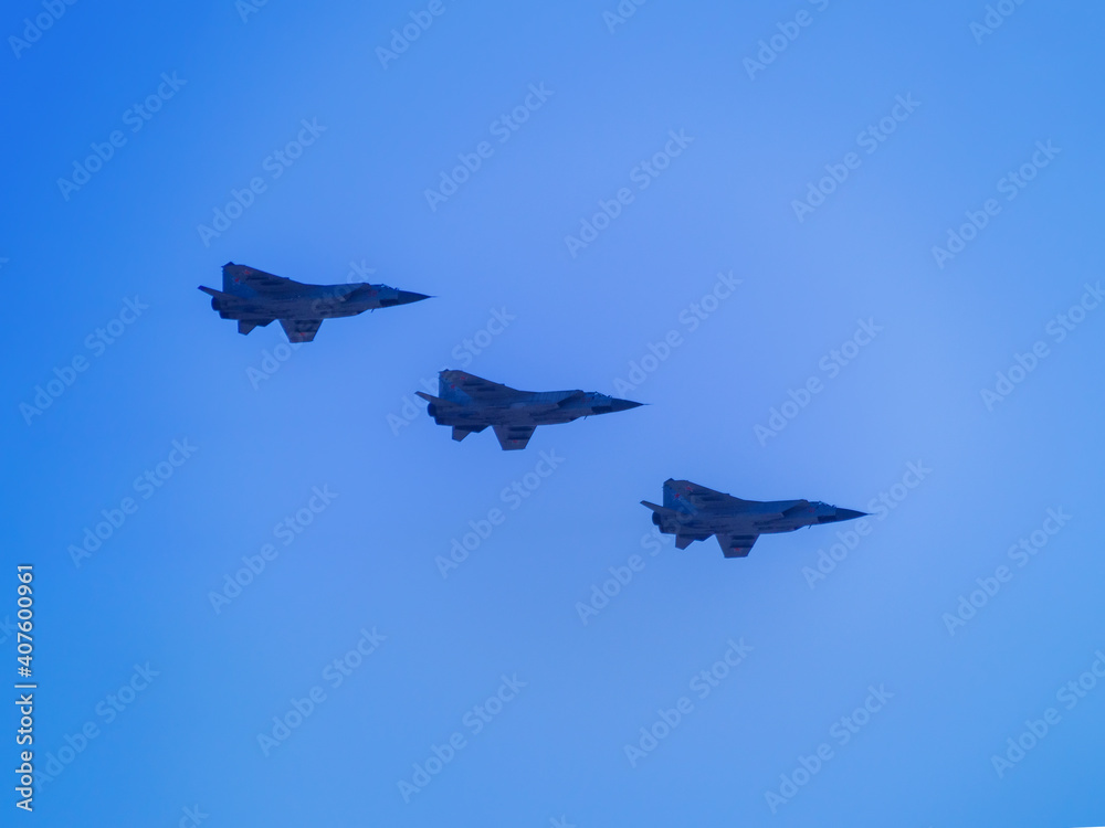 Russia, St. Petersburg - June 24, 2020: Russian Mig-31 fighter demonstrates a demonstration flight at the parade dedicated to the Victory Day in World War II Russia, St. Petersburg - June 24, 2020: Russian Mig-31 fighter demonstrates a demonstration flight at the parade dedicated to the Victory Day in World War II