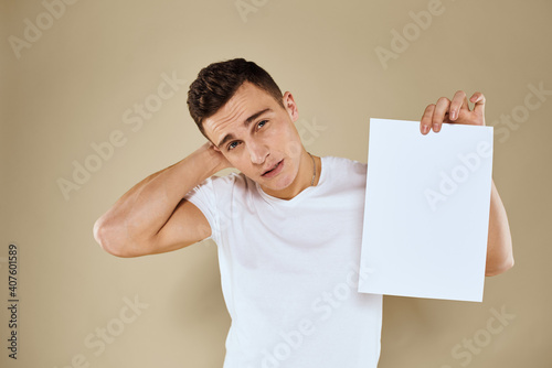 man holding white sheet of paper in hand billboard copy space office