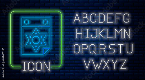 Glowing neon Jewish calendar with star of david icon isolated on brick wall background. Hanukkah calendar day. Neon light alphabet. Vector.
