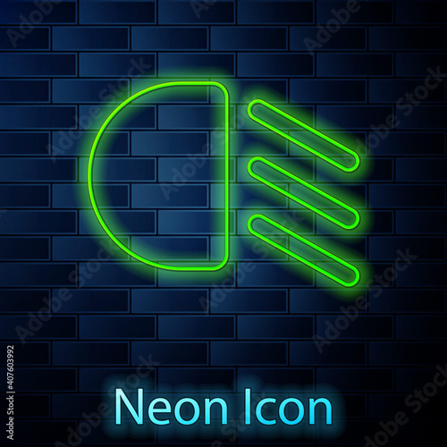 Glowing neon line High beam icon isolated on brick wall background. Car headlight. Vector.