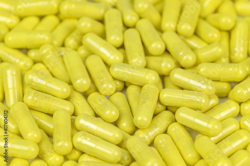 Medicine backgroound of yellow supplements