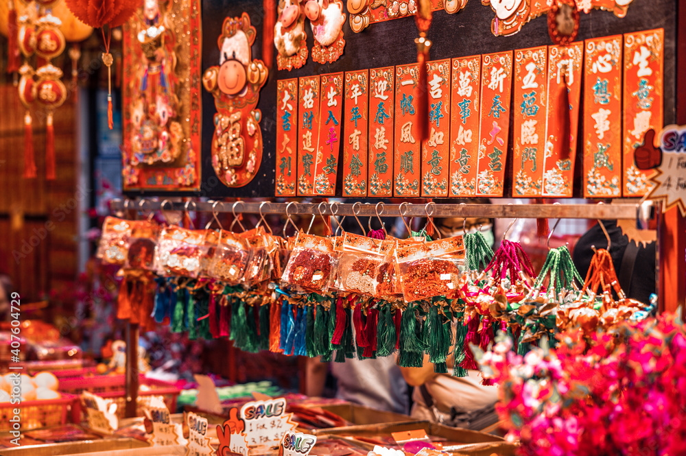 Naklejka premium Outdoor Asia Spring Lunar Chinese New Year ornaments decorations. Red is seen as lucky and auspicious by many who believes in traditional customs. Translation: