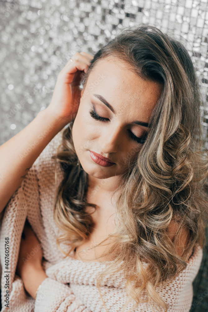 Fototapeta premium Portrait of a very beautiful girl with makeup and studio light