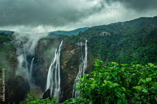 Canvas Print waterfall with lush green forests of western ghat from flat angle