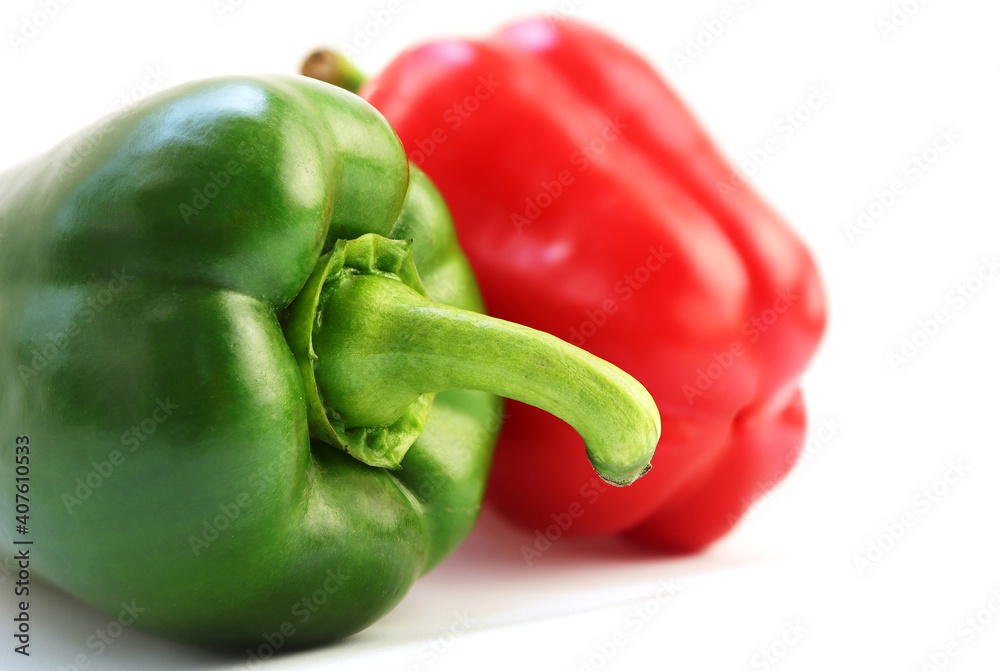 Red and Green bell peppers on white background. sweet bell peppers. Red and Green bell peppers on white background. sweet bell peppers.