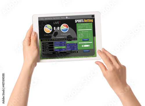 Hands with open page of onl...