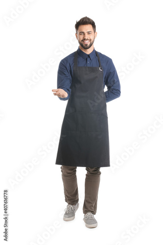 Young man wearing apron on ...