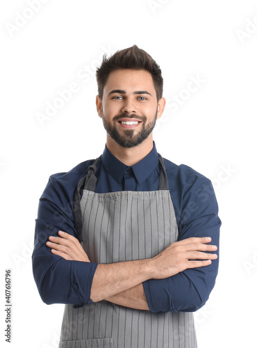 Young man wearing apron on ...