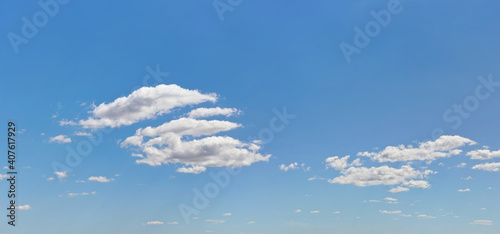 Slika na platnu Bright sky background with few small clouds
