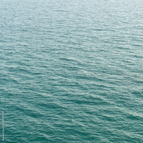 High angle shot of waves on a calm sea - perfect for wallpaper or background
