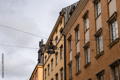 Urban cityscape of Stockholm. City background with street light on foreground and residential buildings on background