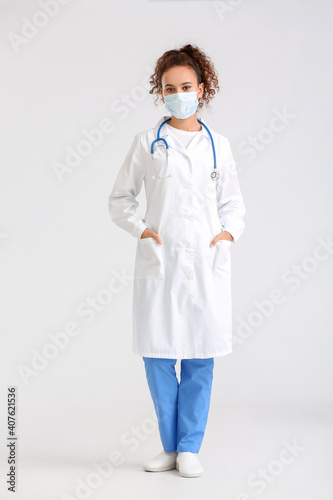 Portrait of female doctor w...