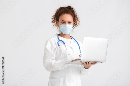 Portrait of female doctor w...