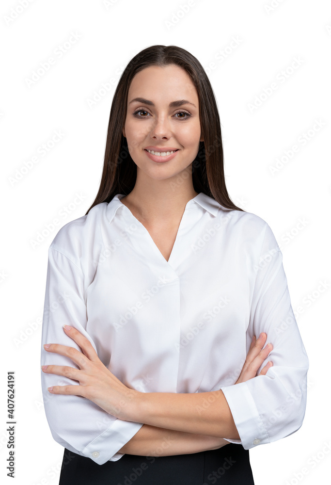 Businesswoman in white shirt smiling, standing isolated over white background. Young female office manager, long hair, with arms crossed looking at the camera Businesswoman in white shirt smiling, standing isolated over white background. Young female office manager, long hair, with arms crossed looking at the camera