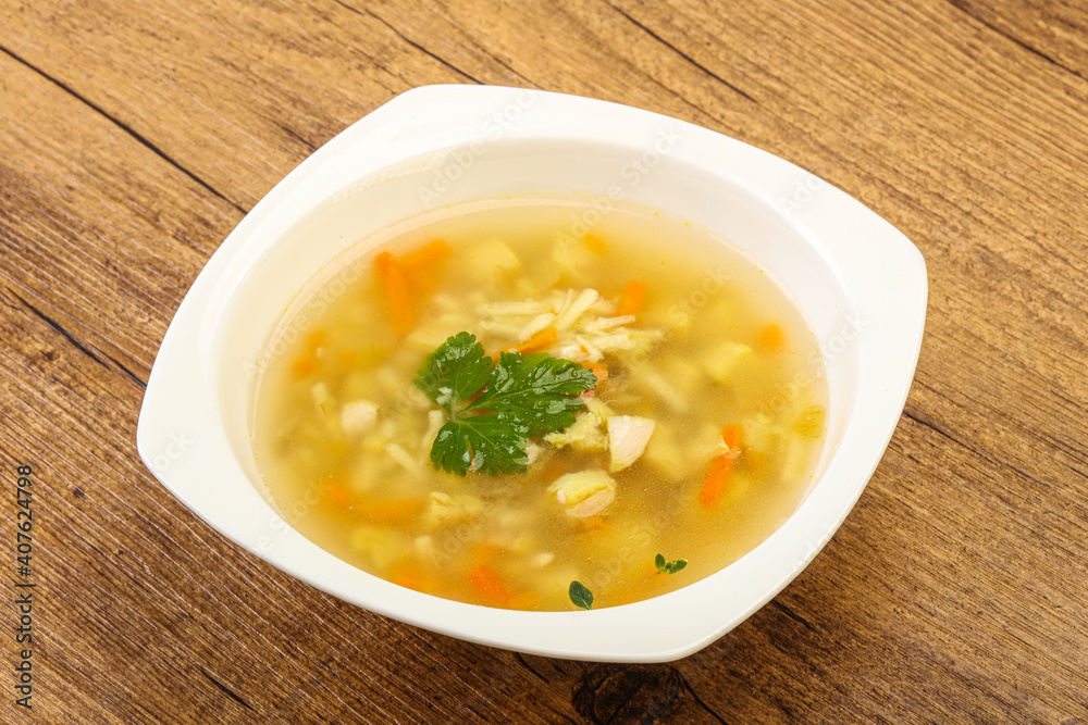 Tasty chicken soup with carrot Tasty chicken soup with carrot