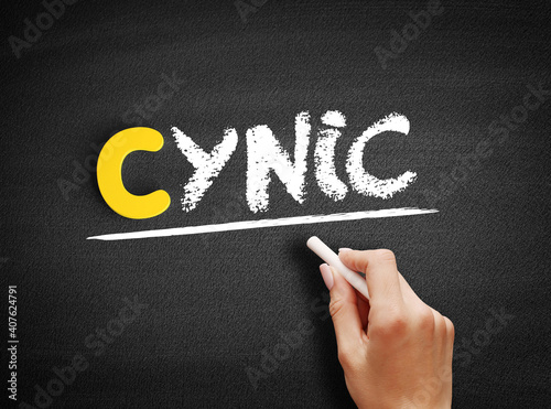 Cynic text on blackboard, concept background