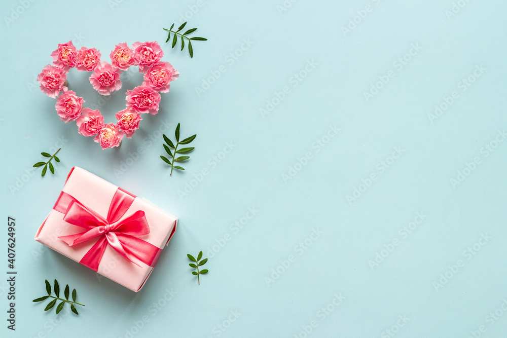 Valentines Day background with pink gift box and flowers Valentines Day background with pink gift box and flowers
