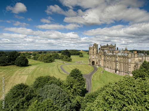 Allerton Castle North Yorkshire, England. Aerial view on a sunny day looking over the historic gothic castle and grounds.  photo