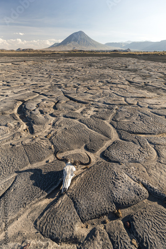 Skull on the mudflats close to Lake Natron with Ol Doinyo Lengai volcano in the background; Tanzania photo