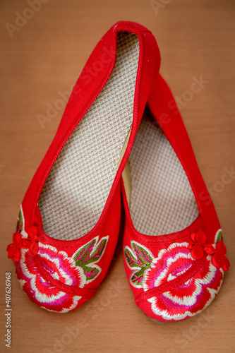 Traditional Chinese style red patterned asian wedding shoes for a bride