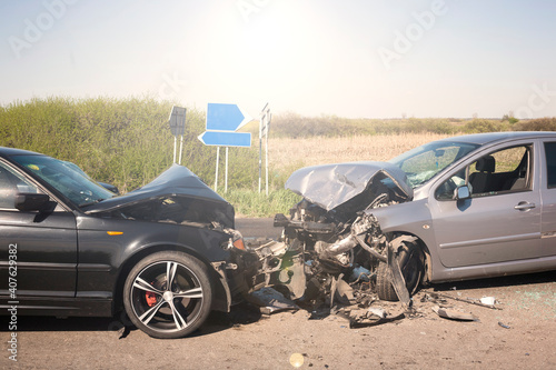 Car crash from car accident on the road in a city, wait insurance