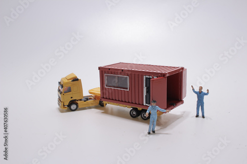 a mini figure with cago , the logistics theme, photo