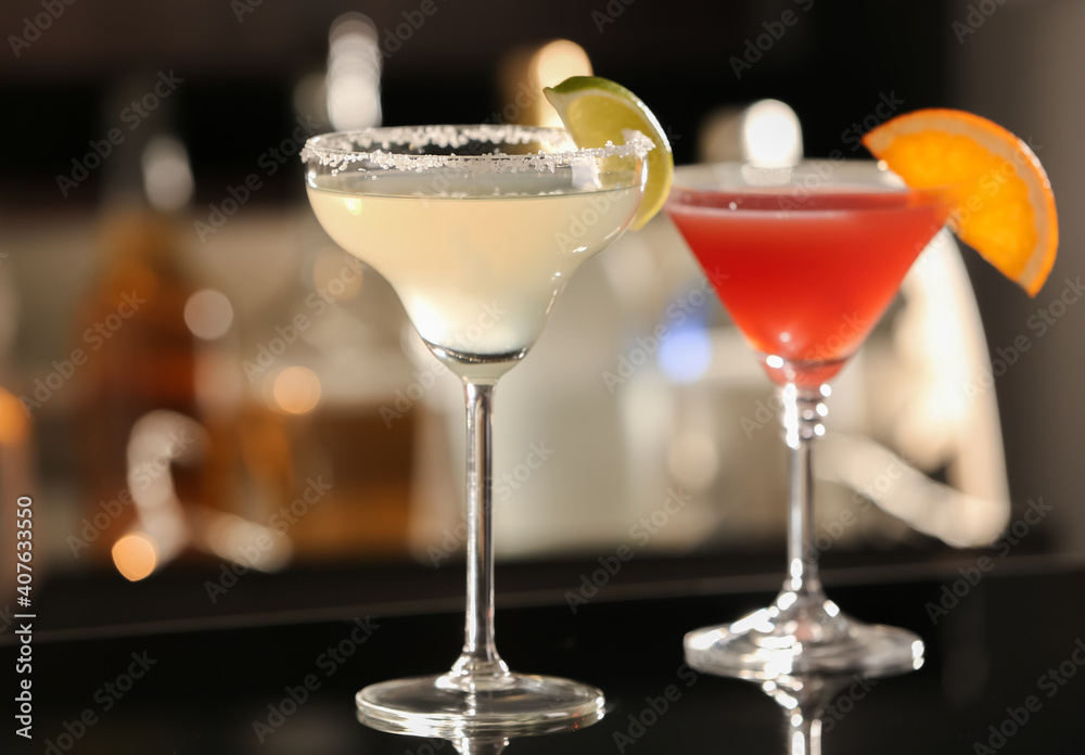 Different delicious cocktails on counter in bar Different delicious cocktails on counter in bar