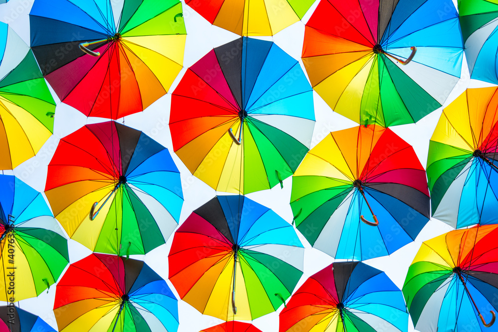 Fototapeta premium Bright colored umbrellas as a background